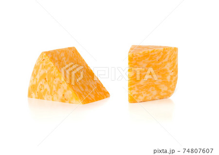 Marble cheese on a white background. Two triangles of cheese close up. Marble cheese on a white background. Two triangles of cheese close up. 74807607