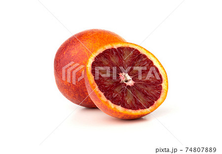 Bloody orange on a white background. Red orange and slice on a white background. 74807889