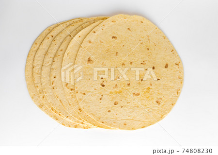 Tortilla on a white background. Several mexican tortilla on a white background. 74808230