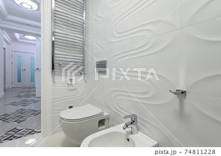 Modern luxury white and chrome bathroom 74811228