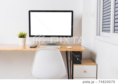 Computer monitor with white blank screen on the business desk Computer monitor with white blank screen on the business desk 74820070