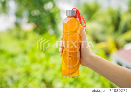 Homemade Fermented Raw Kombucha Tea Ready to Drink With orange and lime. Summer 74820275