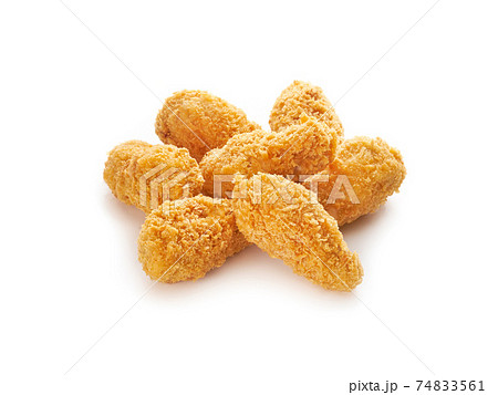 Fried crispy chicken legs on white background 74833561
