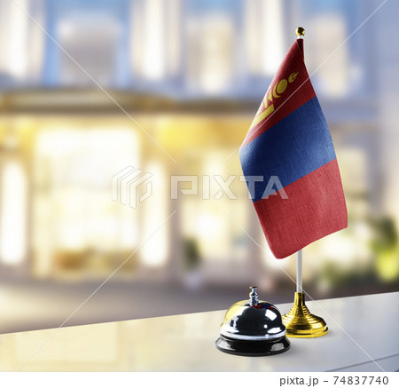 Mongolia flag on the reception desk in the lobby of the hotel 74837740