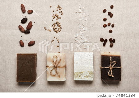 Natural soap bars with ingredients on linen cloth background. Diy cosmetics products 74841334