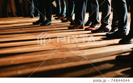 Guests at modern wedding, men say toast and congratulate of newlyweds with marriage 74844044