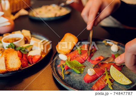Breakfast plate with traditional spanish food, jamon, fried egg, potato tortilla and salami chorizo high angle view. Breakfast plate with traditional spanish food, jamon, fried egg, potato tortilla and salami chorizo high angle view. 74847787