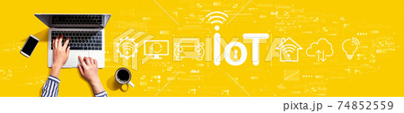 IoT theme with person using laptop IoT theme with person using laptop 74852559