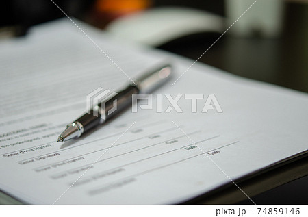 Business pen on paper documents signed. Business pen on paper documents signed. 74859146