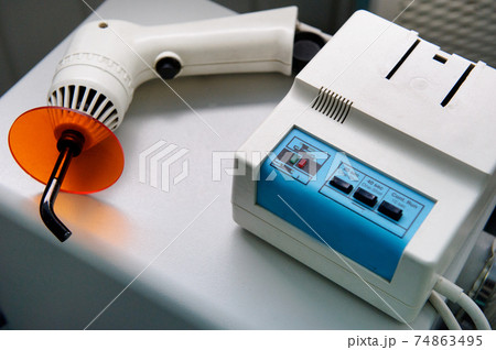 a tool for the dentist before working in his office 74863495