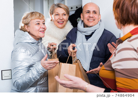 Mature friends are talking about their leisure 74864904