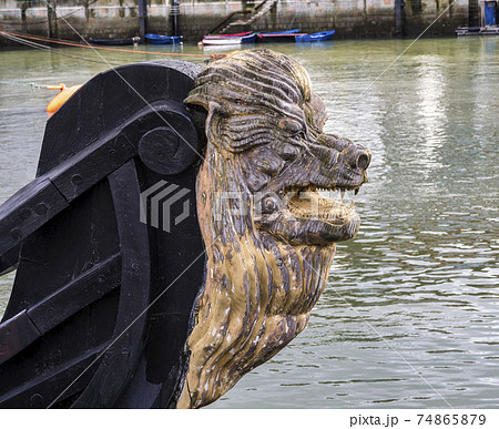 Decorative figure of a lion on the prow of an ancient sailboat at Bermeo in the Basque Country, Spain Decorative figure of a lion on the prow of an ancient sailboat at Bermeo in the Basque Country, Spain 74865879