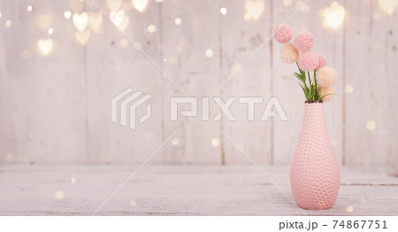 Flowers composition for Valentine's, Mother's or Women's Day. Pink flowers on old white wooden 74867751