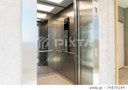 An elevator in the hall An elevator in the hall 74870194