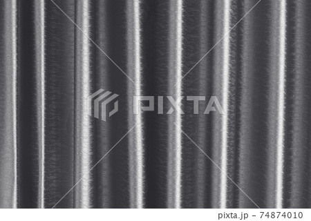 Luxury dark grey silk curtain texture for background and design art work. Luxury dark grey silk curtain texture for background and design art work. 74874010