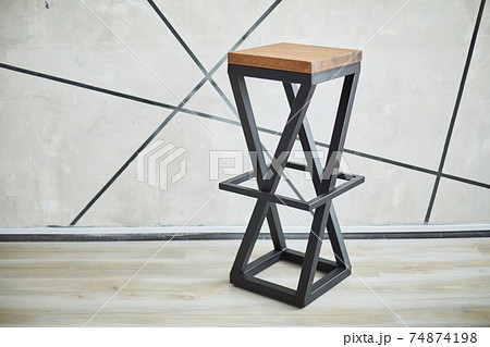 stylish bar chair made of wood and metal. 74874198