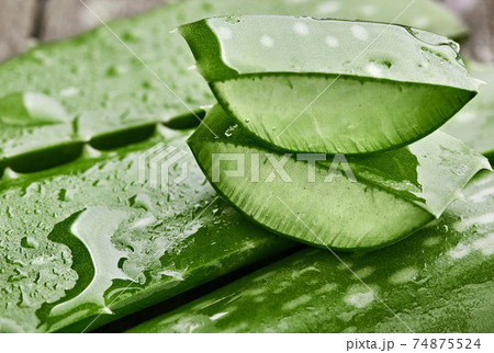 Aloe vera.Pieces of aloe cutting. On wooden table 74875524