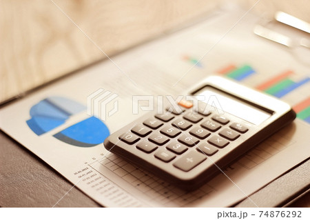 pen, cellphone and business documentation 74876292