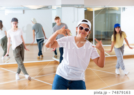 Teenage girl hip hop dancer during class 74879163