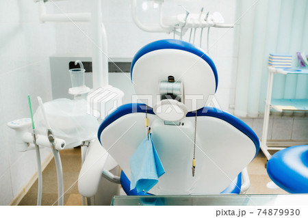 An empty chair in the dentist's office. Empty dentist's office 74879930