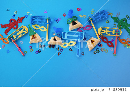 Purim celebration concept. Jewish carnival background. Top view. Flat lay 74880951