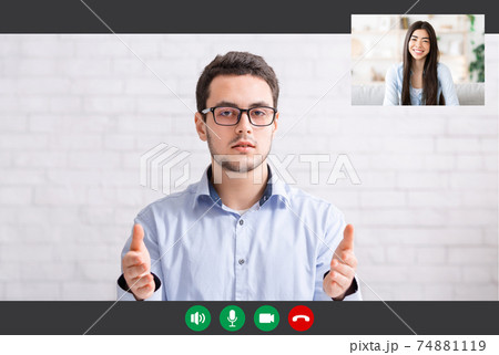 Man And Woman Having Online Video Call Man And Woman Having Online Video Call 74881119