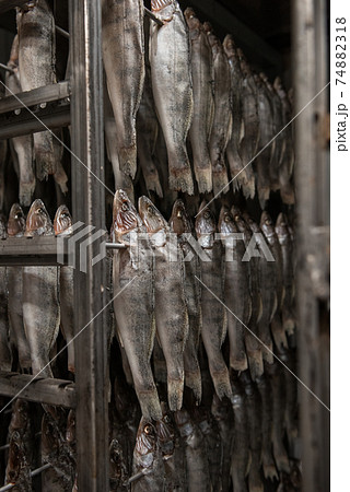Smoked fish production concept 74882318