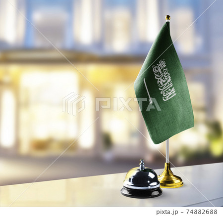 Saudi Arabia flag on the reception desk in the lobby of the hotel 74882688