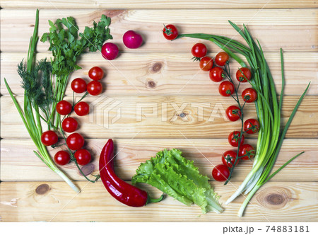 Fresh vegetables on wooden board. Flat layout, top view. 74883181
