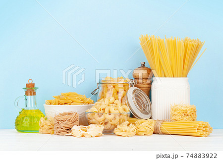 Various types of Italian pasta and olive oil Various types of Italian pasta and olive oil 74883922