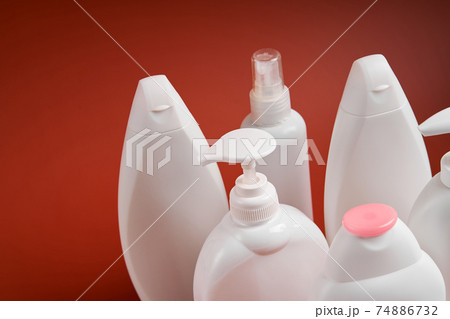 A various shapes blank white plastic bottles of soap products A various shapes blank white plastic bottles of soap products 74886732