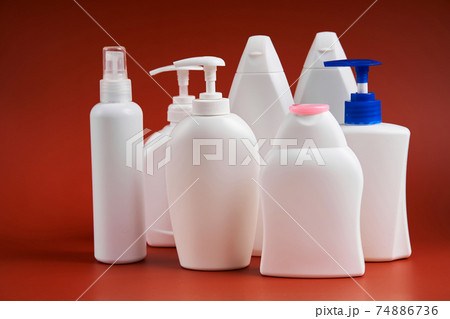 A various shapes blank white plastic bottles of soap products A various shapes blank white plastic bottles of soap products 74886736