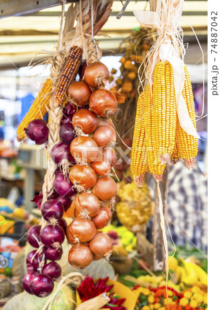 dried corn and onion in fruit market dried corn and onion in fruit market 74887042