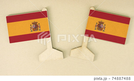 Flags of Spain made of recycled paper on the cardboard desk, flat layout Flags of Spain made of recycled paper on the cardboard desk, flat layout 74887488
