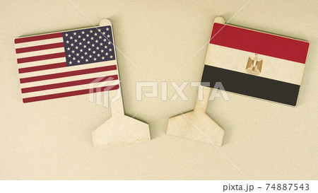 Flags of the USA and Egypt made of recycled paper on the cardboard desk, flat layout 74887543