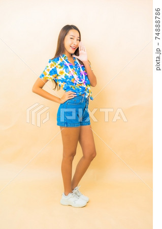 Portrait young asian woman wear colorful shirt for songkran 74888786