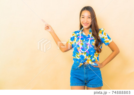 Portrait young asian woman wear colorful shirt for songkran 74888803