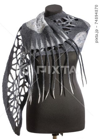 Gray scarf of felted wool on a mannequin on a white background 74894870