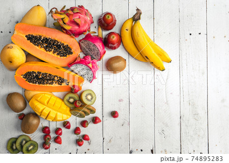 Summer tropical fruit in a plate Summer tropical fruit in a plate 74895283