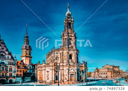 DRESDEN, GERMANY-SEPTEMBER 08, 2015 : Theatre Square (Theaterplatz) in the historic center of Dresden,to the right-Katholische Hofkirche. Center of the Old Town.Saxony, Germany. DRESDEN, GERMANY-SEPTEMBER 08, 2015 : Theatre Square (Theaterplatz) in the historic center of Dresden,to the right-Katholische Hofkirche. Center of the Old Town.Saxony, Germany. 74897326