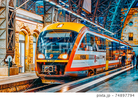 DRESDEN,GERMANY-SEPTEMBER 09,2015: Intercity train at the railways station of Dresden.Rail transport in Germany is at a very high level of progress. Saxony, Germany. 74897794