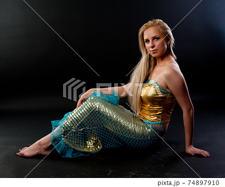 Attractive girl in mermaid costume 74897910