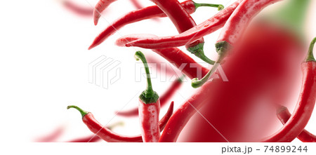 Red hot pepper levitates on a white background 74899244