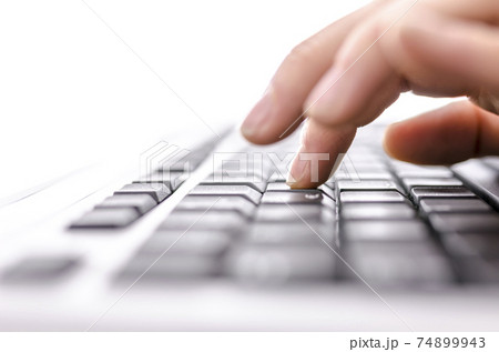 Business woman typing on keyboard 74899943