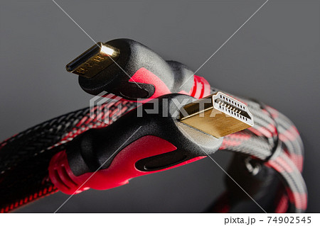 Photo of red colored hdmi cables close-up. 74902545