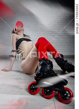 naked slender woman in roller skates red and black color scheme naked slender woman in roller skates red and black color scheme 74903002