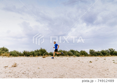 middle-aged male runner running middle-aged male runner running 74912489