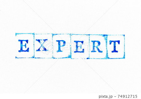 Blue color ink rubber stamp in word expert on white paper background Blue color ink rubber stamp in word expert on white paper background 74912715