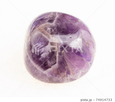 polished Amethyst gemstone on white polished Amethyst gemstone on white 74914733