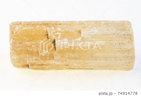 raw gypsum ( selenite ) stone on white 74914778